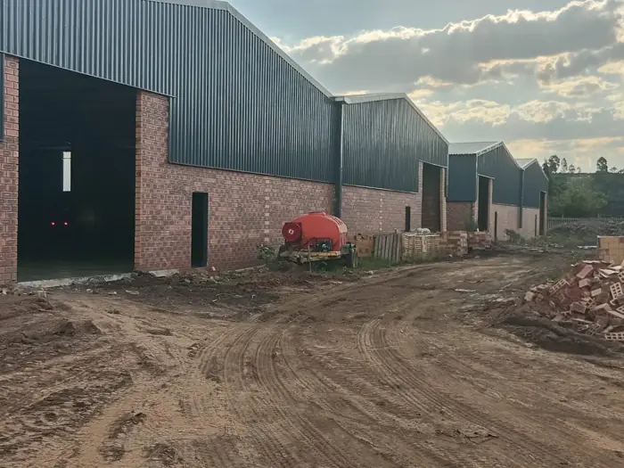 Colour-coated roller doors on factory units