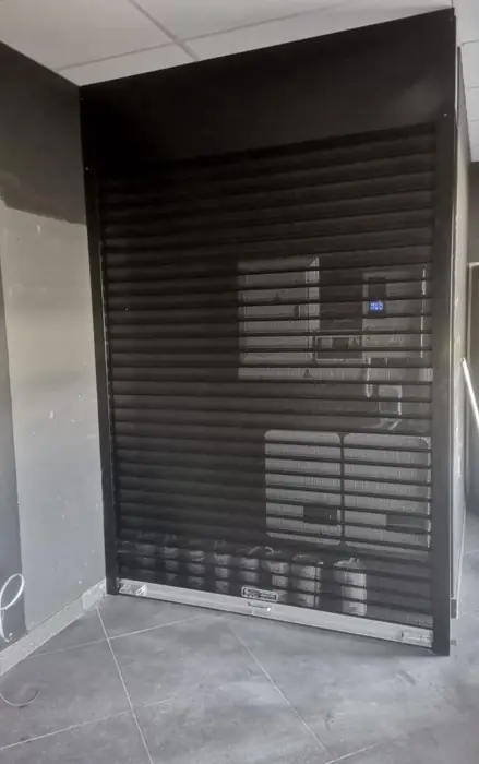 Black perforated vision shutter